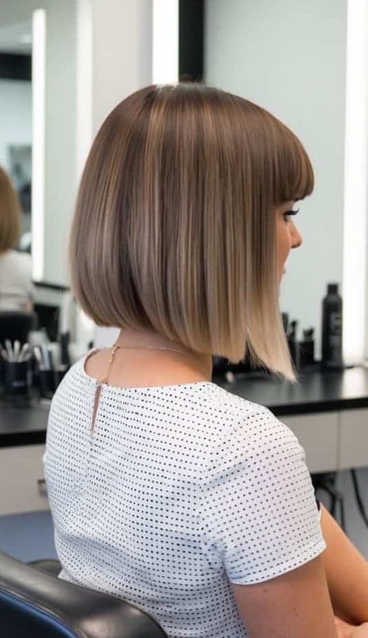 fringe lob haircut women over 60 salon chair stylish